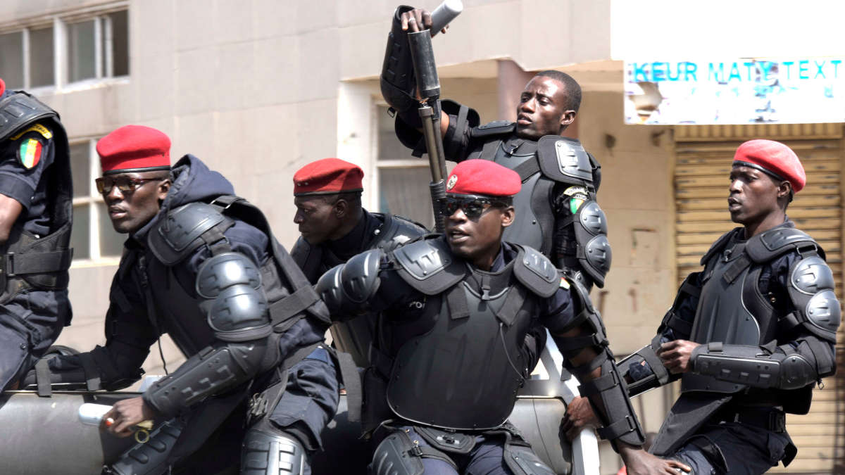 Senegalese policemen patrol during anti-government demonstrations in Dakar on April 19, 2018.
Senegal police fired tear gas to break up an anti-government demonstration in Dakar on April 19, arresting a number of protestors, including the former prime minister Idrissa Seck, AFP journalists and official sources said. With less than a year to go before the presidential election, activists and opposition parties had called a rally outside parliament to protest against proposed changes to the electoral code and the constitution.  / AFP PHOTO / SEYLLOU